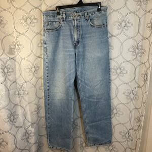 Men's Levi 550 relaxed fit blue jeans light wash size 34 x 32‎
